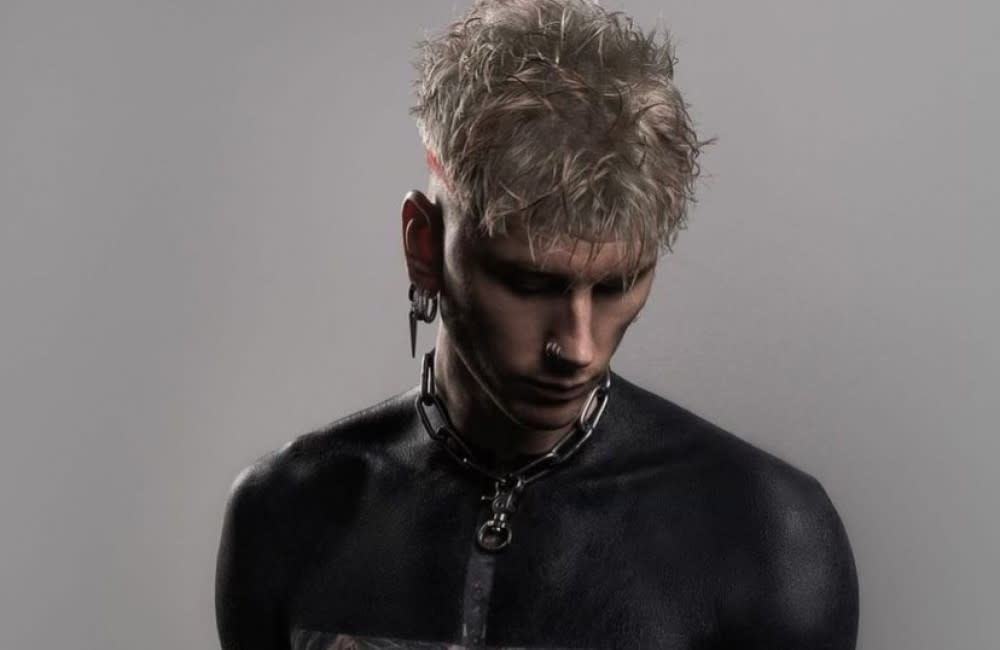 Machine Gun Kelly is said to have undergone his shock body blackout tattoo to show his girlfriend Megan Fox he can ‘change’ for the sake of their turbulent relationship credit:Bang Showbiz