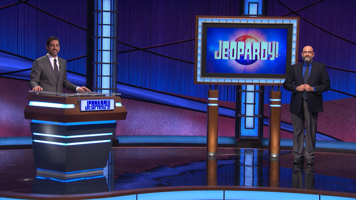 Palm Springs resident Dennis Chase shares the "Jeopardy!" stage with guest host Aaron Rodgers. Chase will appear on the show again on Nov. 10, 2023 during a champion's tournament.