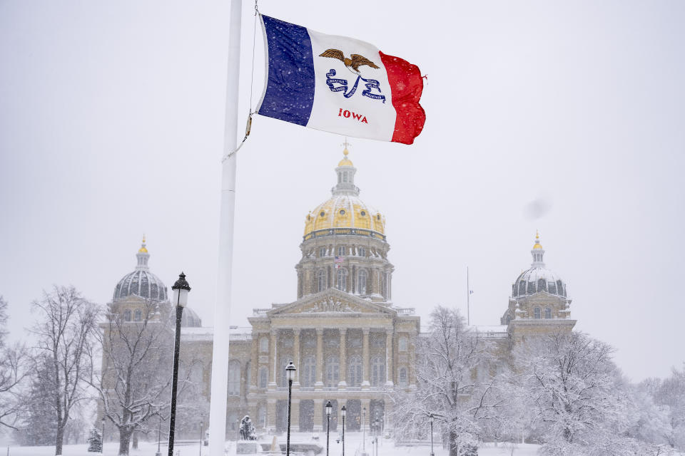 FILE - Snow falls at the Iowa State Capitol Building in Des Moines, Iowa, Jan. 9, 2024, as a winter snow storm hits the state. As frigid temperatures scour the Midwest, Monday, Jan. 15, marks the official start to the Republican presidential nominating contest with the Iowa caucuses. Iowa has been relatively quiet this cycle compared to years past, because former President Donald Trump is dominating the contest. That makes one of the things to watch Monday who comes in second. (AP Photo/Andrew Harnik, File)