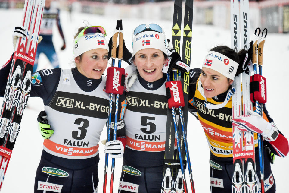 Marit Bjorgen (center), Ingvild Flugstad Ostberg (left) and Heidi Weng have helped Norway dominate the Winter Games so far. (Reuters)