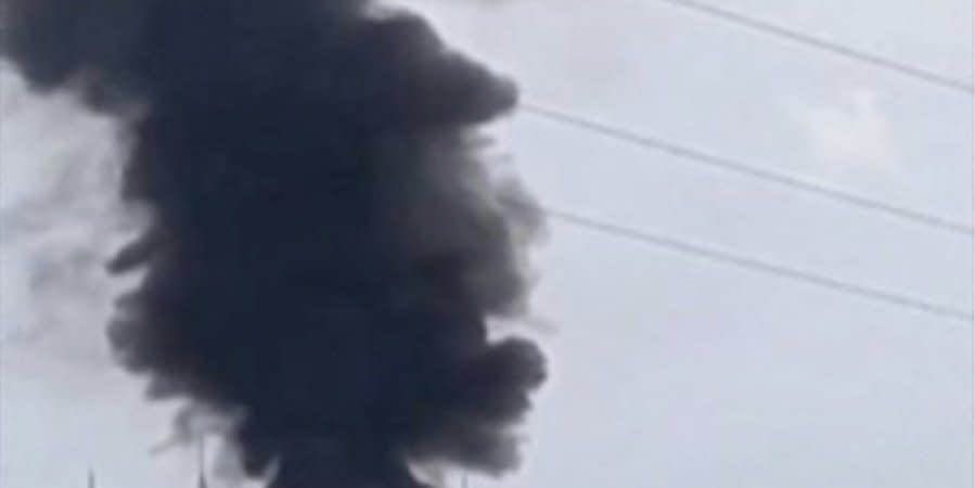 Clouds of black smoke can be seen above the village of Hvardiiske