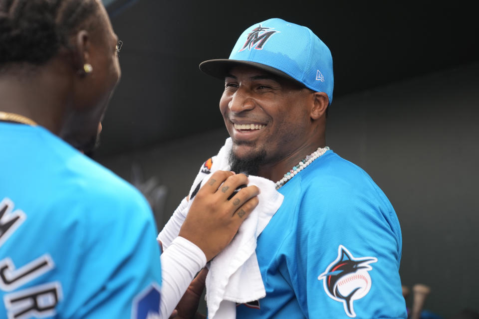 Miami Marlins' Sixto Sanchez, right, is congratulated by teammate Jazz Chisholm Jr. after pitching the fifth inning of a spring training baseball game against the New York Mets Saturday, March 2, 2024, in Jupiter, Fla. (AP Photo/Jeff Roberson)