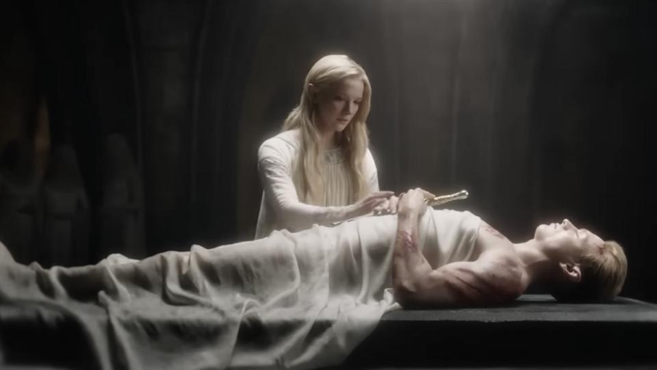 Galadriel stands over her brother Finrod's injured dead body on The Rings of Power