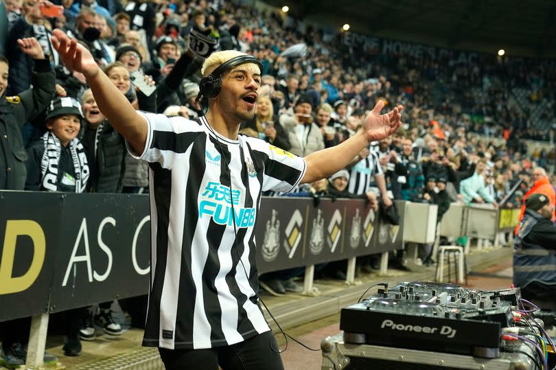 DJ Schak performs for the fans at St James' Park