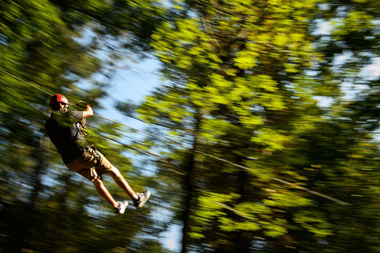 David Ragan ziplining at Zipquest Waterfall & Treetop Adventure Park on Wednesday, Oct. 7, 2020.