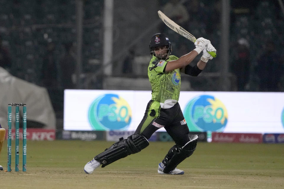 Lahore Qalandars' Sahibzada Farhan plays a shot during the Pakistan Super League T20 cricket match between Quetta Gladiators and Lahore Qalandars, in Lahore, Pakistan Monday, Feb. 19, 2024. (AP Photo/K.M. Chaudary)