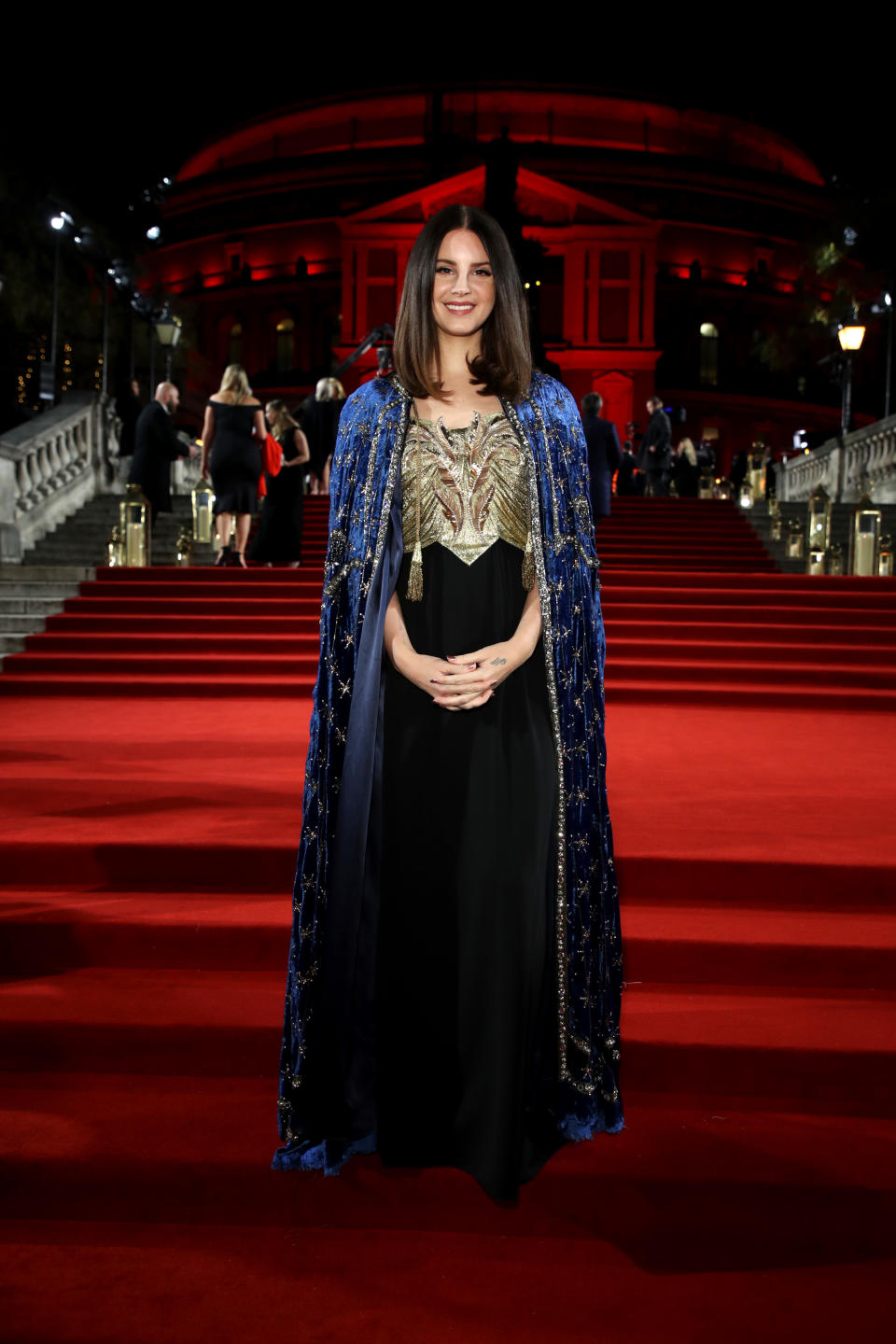 <p>The singer wore a Gucci outfit on the red carpet consisted of a velvet cape and beaded gown. <em>[Photo: Getty]</em> </p>