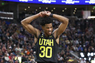 Utah Jazz guard Ochai Agbaji (30) reacts after a play against the Dallas Mavericks in the first half of an NBA basketball game Saturday, Jan. 28, 2023, in Salt Lake City. (AP Photo/Rob Gray)