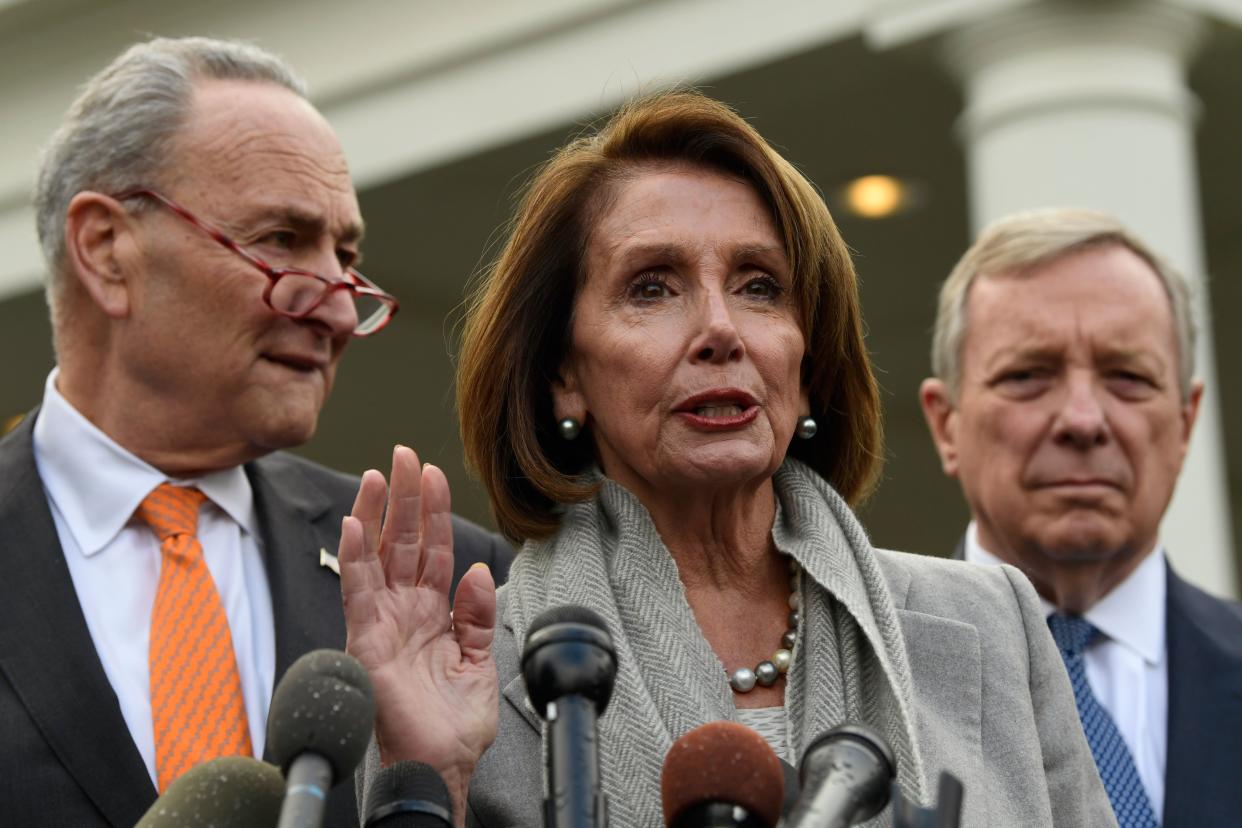 House Speaker Nancy Pelosi of Calif., center, speaks about her oath of office as she stands next to Senate Minority Leader Sen. Chuck Schumer of N.Y., left, and Sen. Dick Durbin, D-Ill., right, following their meeting with President Donald Trump at the White House in Washington, Wednesday, Jan. 9, 2019.