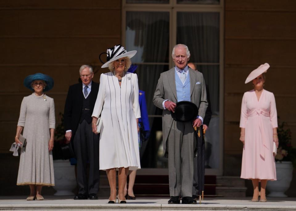 King Charles III and Queen Camilla, stand with the Duke and Duchess of Edinburgh (right) and the Duke and Duchess of Gloucester (left) as they listen to the national anthem (Jordan Pettitt/PA Wire)