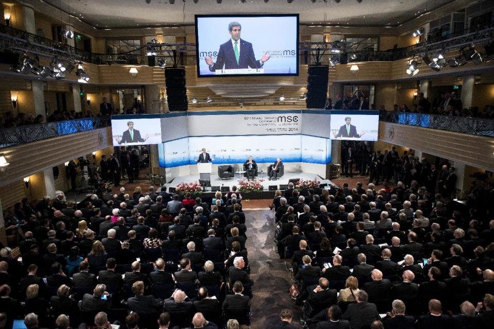 US Secretary of State John Kerry is seen on a video screen as he speaks during the Munich Security Conference at the Bayerischer Hof Hotel Saturday, Feb. 1, 2014 in Munich, southern Germany. The annual meeting was set to deal with thorny international issues, from the Syrian war and Ukraine's turmoil to Iran's nuclear program and US online surveillance. (AP Photo/Brendan Smialowski ,Pool)