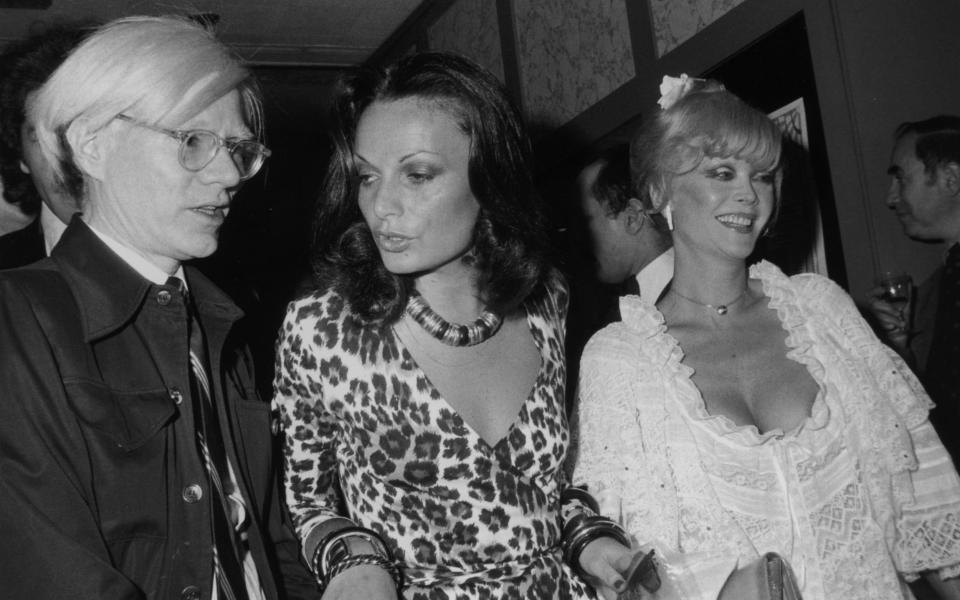 Andy Warhol, Diane von Furstenberg and Monique Van Vooren - Tim Boxer/Hulton Archive/Getty Images