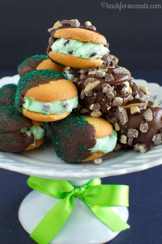 <p>Back For Seconds</p><p>These No-Bake Mint Chip Sandwich Cookies are so incredibly delicious, you would never guess how easy they are to make! </p><p><strong>Get the recipe: <a href="https://backforseconds.com/no-bake-mint-chip-sandwich-cookies/" rel="nofollow noopener" target="_blank" data-ylk="slk:No-Bake Mint Chip Sandwich Cookies;elm:context_link;itc:0;sec:content-canvas" class="link rapid-noclick-resp">No-Bake Mint Chip Sandwich Cookies</a></strong></p>
