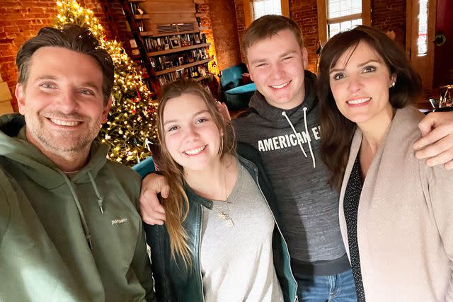 <p>Courtesy of Taya Kyle</p> Bradley Cooper with McKenna, Colton and Taya Kyle in 2022