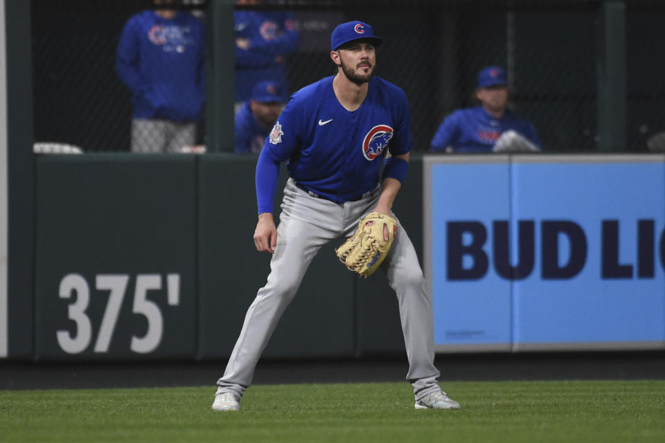 Chicago Cubs left fielder Kris Bryant takes up his position during the seventh inning of a baseball game against the St. Louis Cardinals Monday, July 19, 2021, in St. Louis. (AP Photo/Joe Puetz)