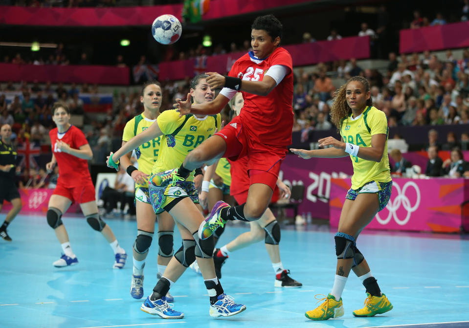 LONDON, ENGLAND - AUGUST 03: Emiliia Turei #25 of Russia loses control of the ball during the Women's Handball Preliminaries Group A match between Russia and Brazil on Day 7 of the London 2012 Olympic Games at Copper Box on August 3, 2012 in London, England. (Photo by Jeff Gross/Getty Images)