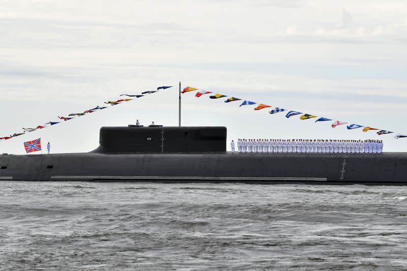 Sailors line up on a deck of the nuclear-powered ballistic missile submarine K-549 Knyaz Vladimir before the Navy Day parade in Saint Petersburg