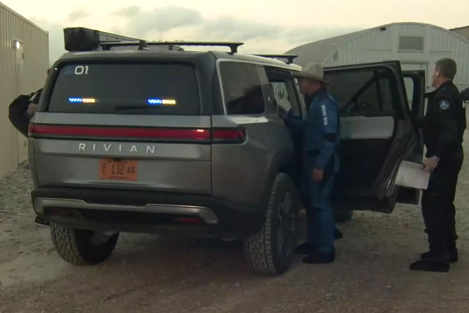 <div class="cell medium-auto caption">Jeff Bezos hopping in Rivian’s electric SUV on the way to the launch site.</div> <div class="cell medium-shrink medium-text-right credit">Screenshot via Blue Origin on YouTube</div>