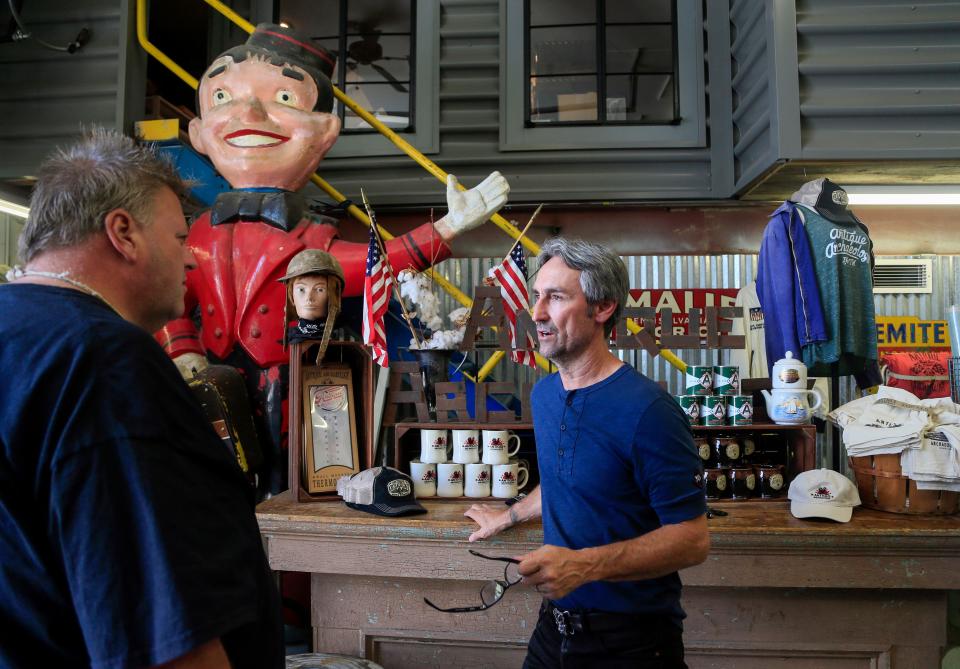 Mike Wolfe of American Pickers fame chats with customers at his store Antique Archaeology in LeClaire June 27, 2018.