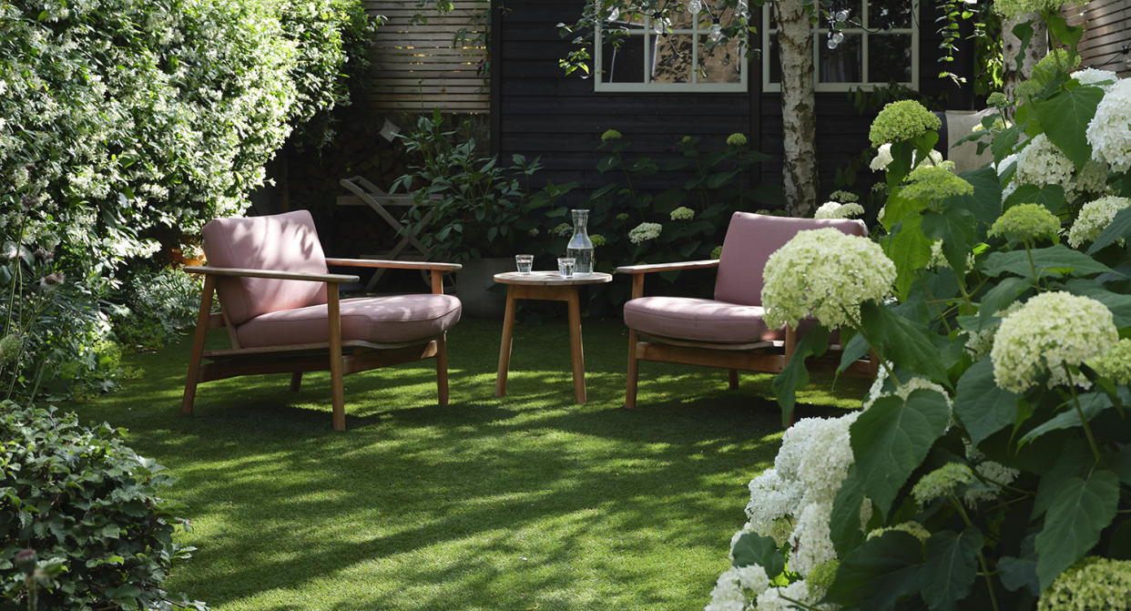  backyard with armchairs and coffee table 