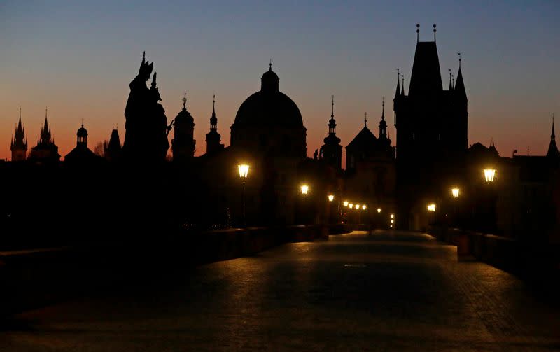 The empty medieval Charles Bridge is seen in Prague