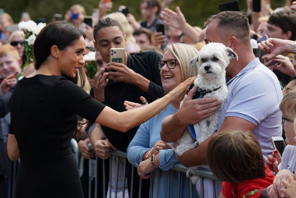 The Duchess of Sussex meeting members of the public at Windsor Castle in Berkshire following the death of Queen Elizabeth II (PA)