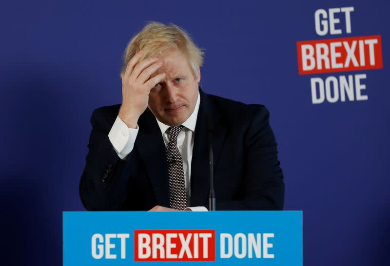 Britain's Prime Minister Boris Johnson and Chancellor of the Duchy of Lancaster Michael Gove hold a joint news conference