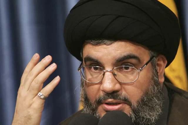 FILE - Hezbollah leader Hassan Nasrallah, speaks during a press conference at Hezbollah headquarters in the southern suburb of Beirut, Monday June 5, 2006. (AP Photo/Hussein Malla, File)