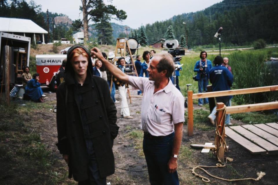 Roeg with David Bowie on the set of The Man Who Fell to Earth in 1975.