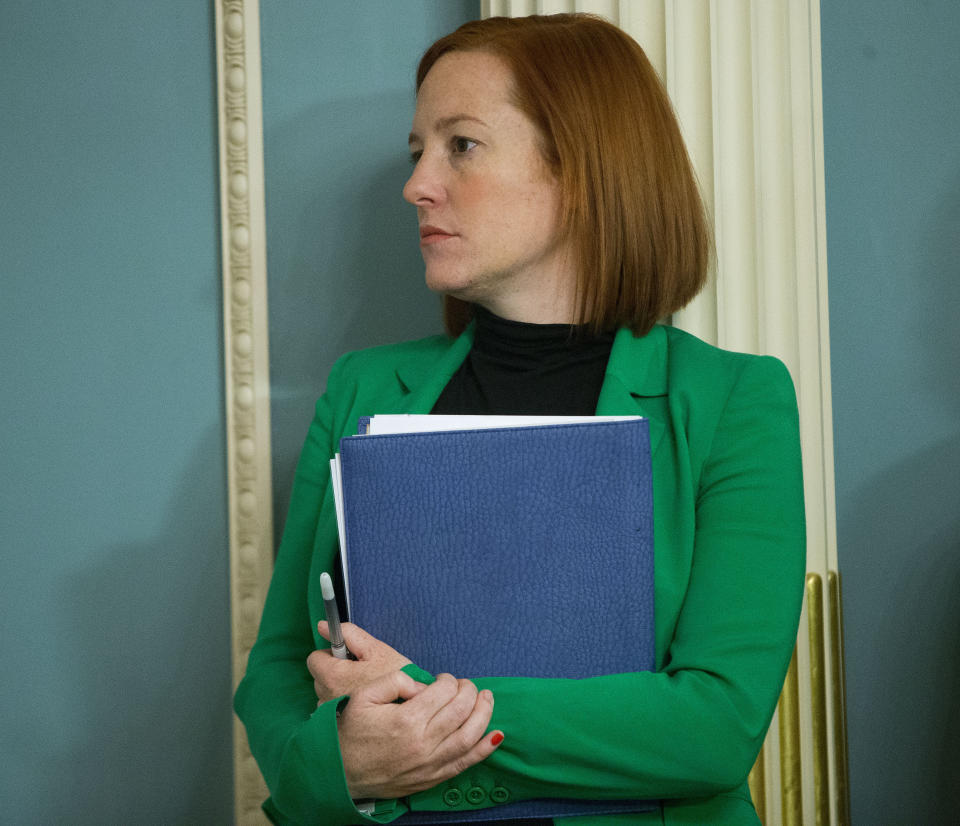 FILE - In this Feb. 27, 2015, file photo State Department spokeswoman Jen Psaki listens during a meeting between Secretary of State John Kerry and Liberian President Ellen Johnson at the State Department in Washington. (AP Photo/Pablo Martinez Monsivais, File)