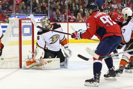 Dec 16, 2017; Washington, DC, USA; Washington Capitals center Evgeny Kuznetsov (92) scores a goal on Anaheim Ducks goalie John Gibson (36) in the third period at Capital One Arena. The Capitals won 3-2 in overtime. Mandatory Credit: Geoff Burke-USA TODAY Sports