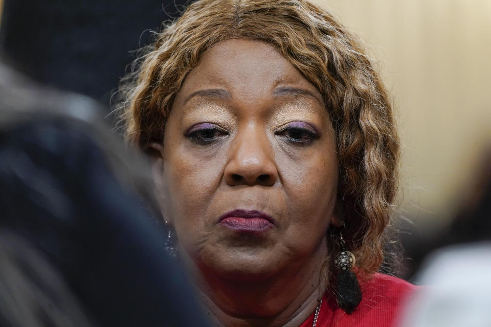 FILE - Ruby Freeman, mother of Wandrea "Shaye" Moss, a former Georgia election worker, listens as the House select committee investigating the Jan. 6 attack on the U.S. Capitol continues to reveal its findings of a year-long investigation, at the Capitol in Washington, Tuesday, June 21, 2022. Freeman, a former Georgia election worker suing Rudy Giuliani over false claims he spread about her and her daughter in 2020, cried on the witness stand on Wednesday, Dec. 13, 2023, as she described fleeing her home after she endured racist threats and strangers banging on her door. (AP Photo/Jacquelyn Martin, File)