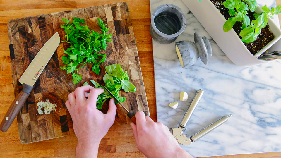 This cutting board has stabilizing feet that'll keep it level.