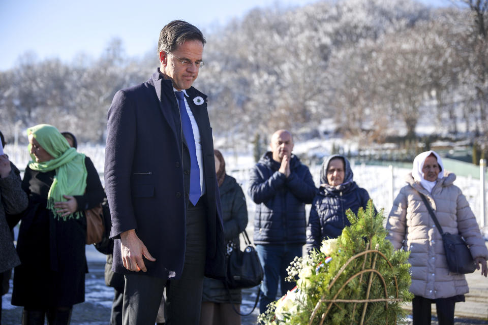 Prime Minister of the Netherlands, Mark Rutte, pays his respects after laying a wreath at the Srebrenica Memorial Center in Potocari, Bosnia, Monday, Jan. 22, 2024. (AP Photo/Armin Durgut)