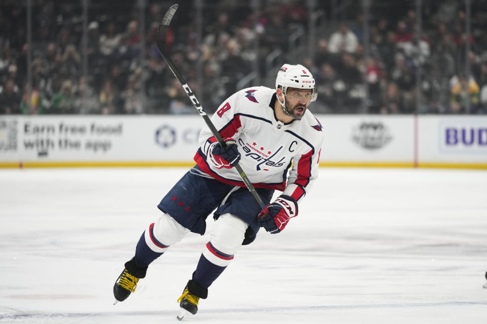 Washington Capitals' Alex Ovechkin (8) chases the puck during the first period of an NHL hockey game against the Los Angeles Kings Monday, March 6, 2023, in Los Angeles. (AP Photo/Jae C. Hong)