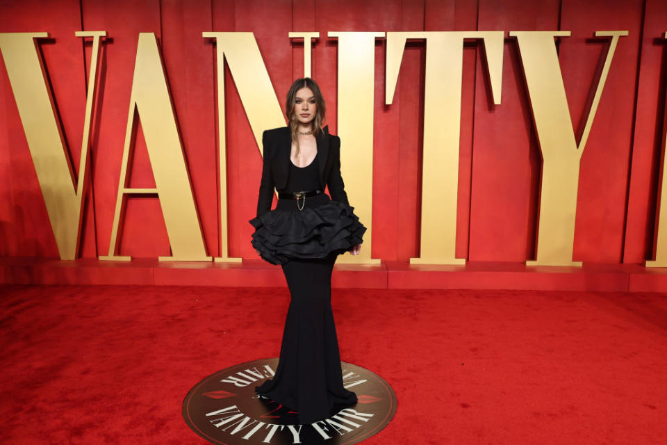 Hailee Steinfeld in a ruffled black dress at a Vanity Fair event