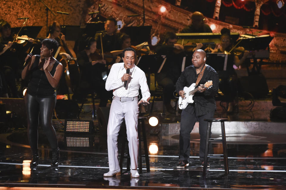 FILE - In this Feb.12, 2019 file photo, Smokey Robinson performs during Motown 60: A GRAMMY Celebration at the Microsoft Theater in Los Angeles. Motown Records founder Berry Gordy says his historic label brought people from all walks of life through a "legacy of love" at the "Motown 60: A Grammy Celebration" during a taped tribute that will air April 21 on CBS. (Photo by Richard Shotwell/Invision/AP, File)