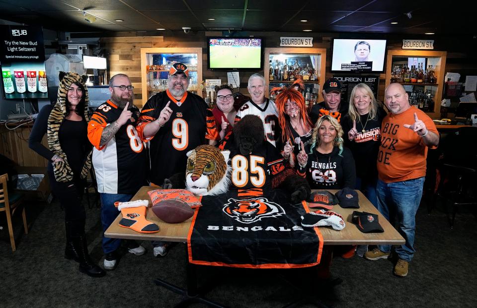 Columbus Bengal Nation Facebook group will cheer on the Bengals in Super Bowl LVI at The Pub in Gahanna. Members of the group poses for a photo on February 10, 2022. The group has reached 700 members and over 100 members are suppose to show up on Sunday to watch the game.  
