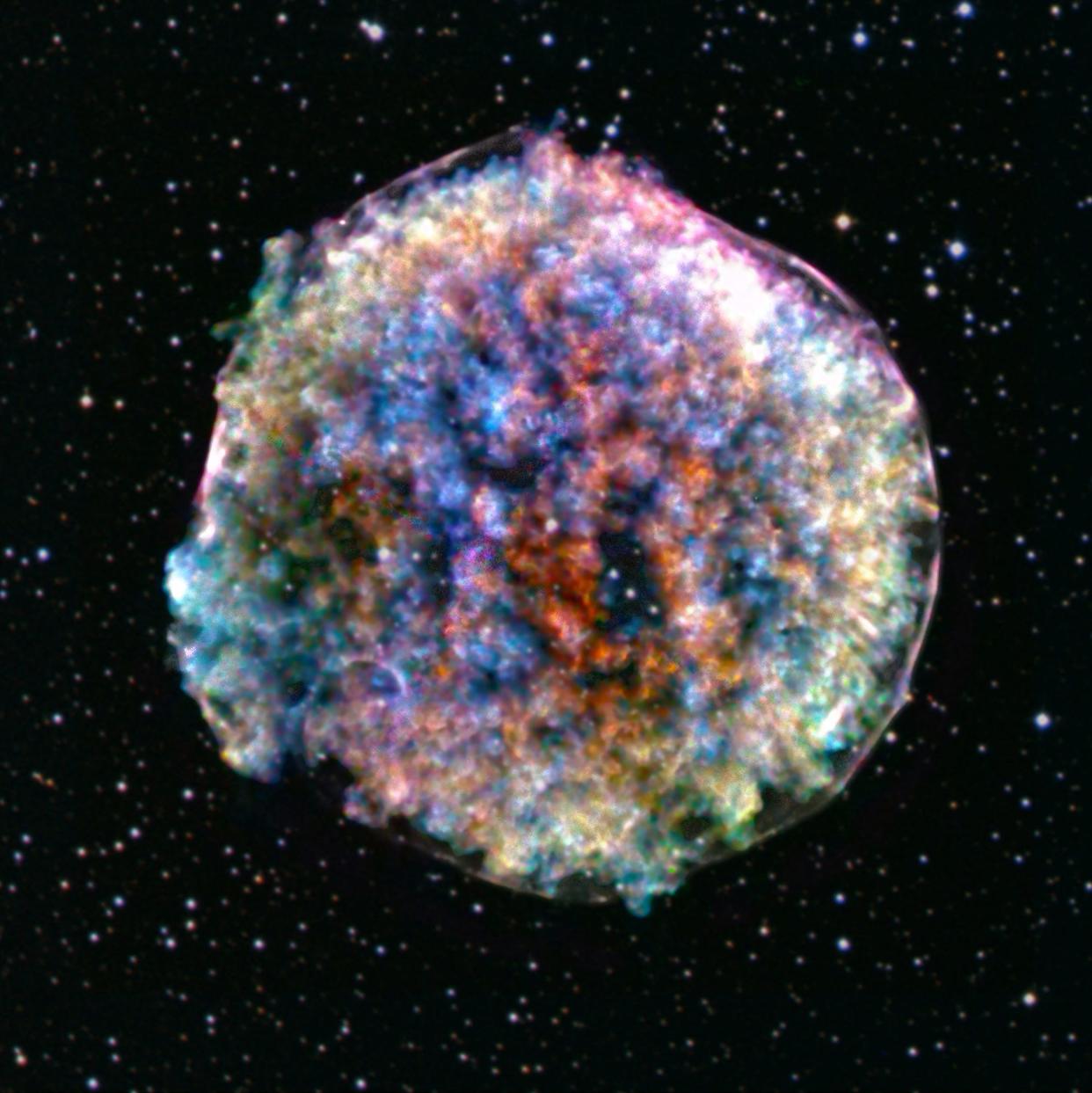 supernova remnant in space clumpy colorful textured bubble with shades of red orange blue yellow green purple white