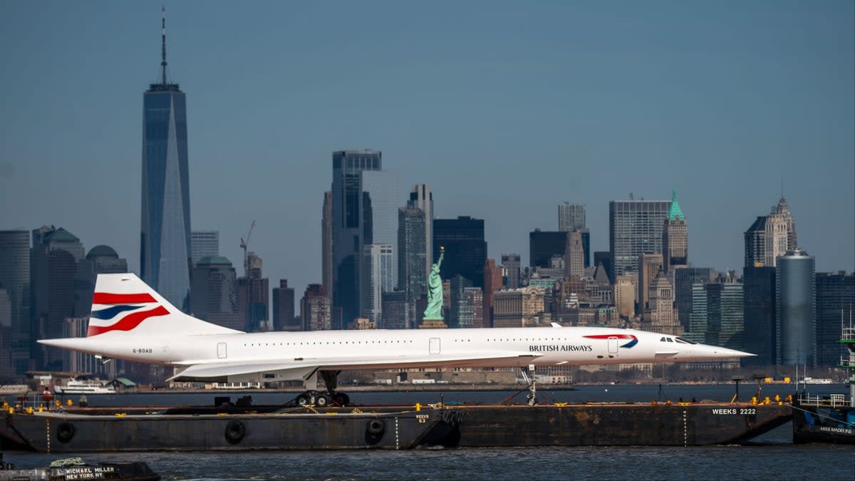 A retired British-Airways Concorde supersonic airliner is moved on a barge up the Hudson River. (Getty Images)