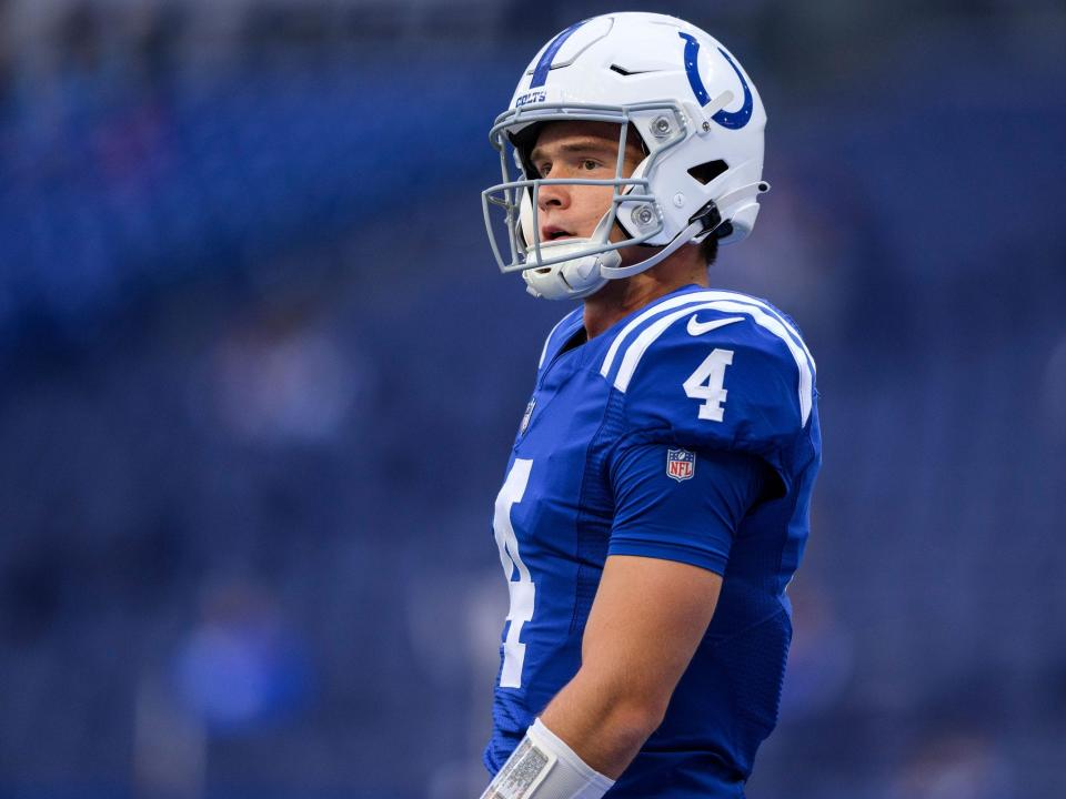 Sam Ehlinger warms up before a game against the Jacksonville Jaguars.