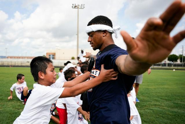 Pat Surtain and Javonte Williams to host youth football camp in July