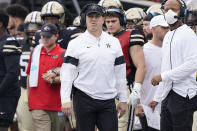 Vanderbilt head coach Clark Lea, center, watches from the sideline in the first half of an NCAA college football game against Georgia Saturday, Sept. 25, 2021, in Nashville, Tenn. (AP Photo/Mark Humphrey)