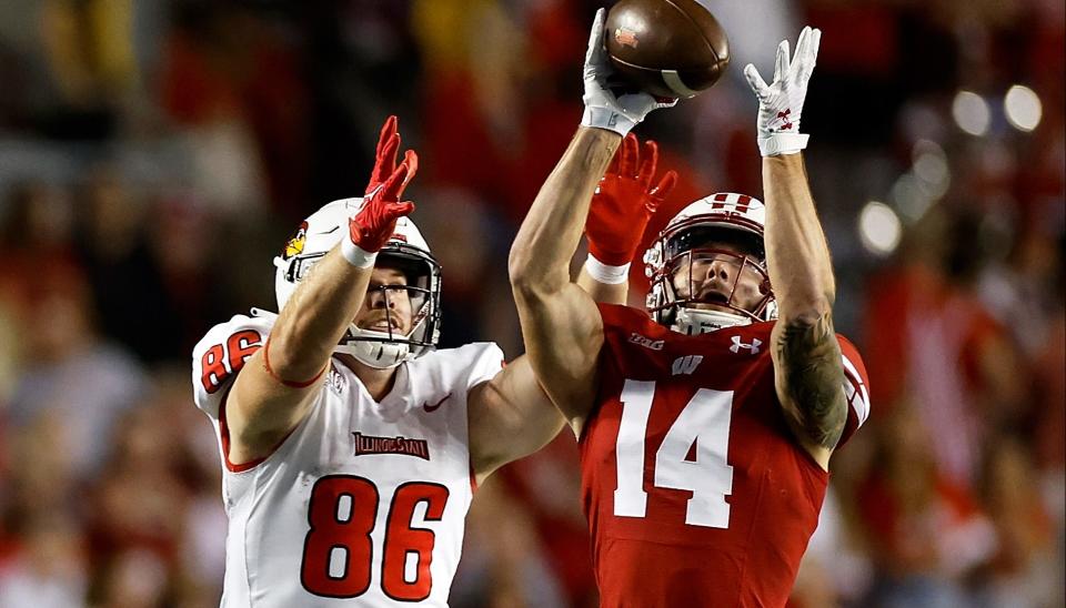 Preston Zachman #14 of the Wisconsin Badgers intercepts a pass in the fourth quarter against the Illinois State Redbirds at Camp Randall Stadium on Sept. 3, 2022 in Madison, Wisconsin. John Fisher/Getty Images