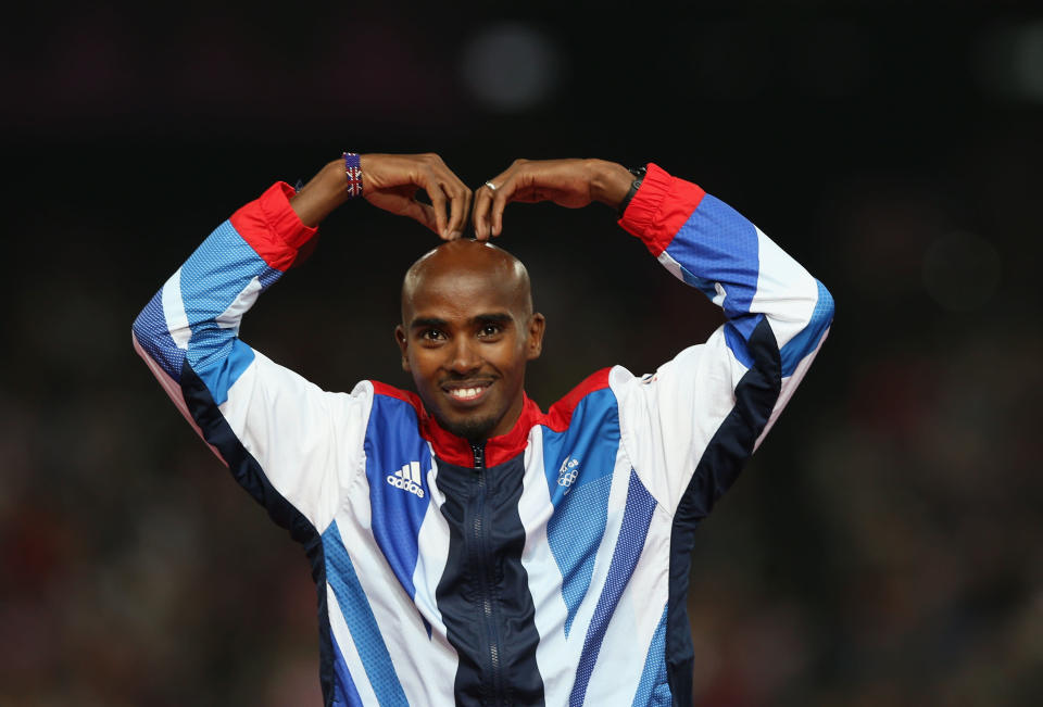 5) Who invented Mo Farah’s M-Bot celebration?<br><br> A) His coach<br> B) His wife<br> C) A BBC host<br> D) Galen Rupp<br><br> (Photo by Clive Brunskill/Getty Images)