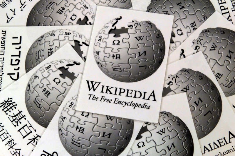 On January 15, 2001, free online encyclopedia Wikipedia debuts, giving users the ability to create and edit articles. File Photo by Boris Roessler/EPA