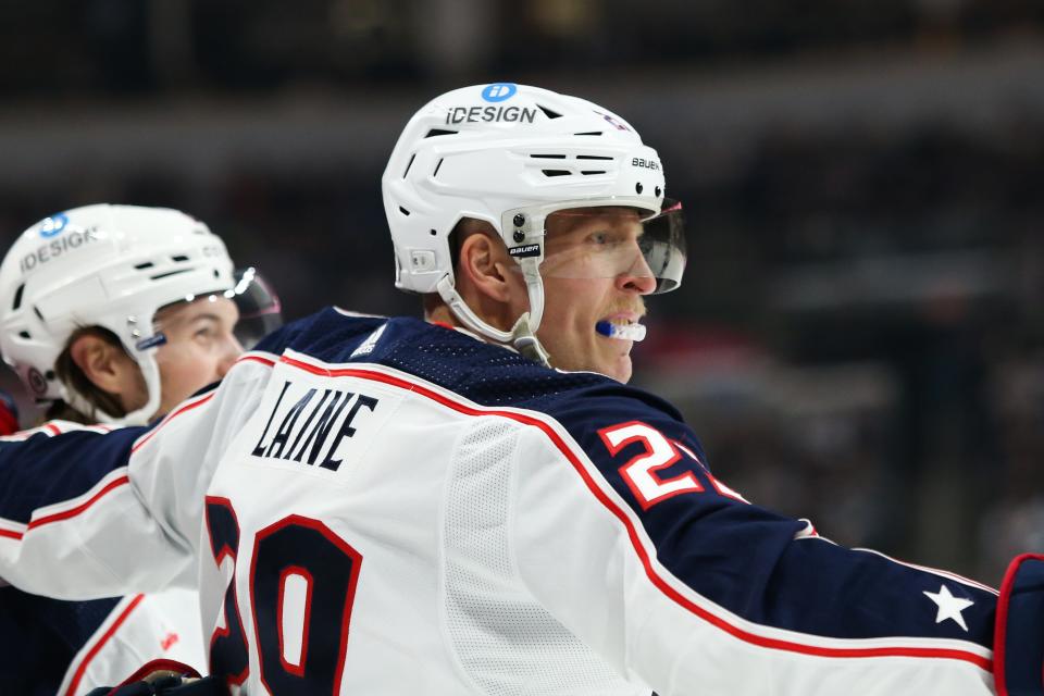 Dec 2, 2022; Winnipeg, Manitoba, CAN;  Columbus Blue Jackets forward Patrik Laine (29) celebrates his goal against Winnipeg Jets goalie David Rittich (33) during the first period at Canada Life Centre. Mandatory Credit: Terrence Lee-USA TODAY Sports