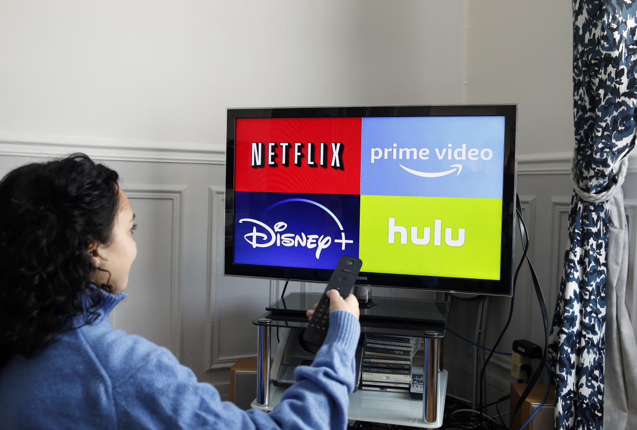 PARIS, FRANCE - NOVEMBER 20: In this photo illustration, the logos of media service providers, Netflix, Amazon Prime Video, Disney + and Hulu are displayed on the screen of a television on November 20, 2019 in Paris, France. Netflix, the US giant of online video subscription, has more than 5 million subscribers in France, 4 and a half years after its arrival in France in September 2014. Netflix offers movies and TV series over the internet and now has 137 million subscribers worldwide. (Photo by Chesnot/Getty Images)