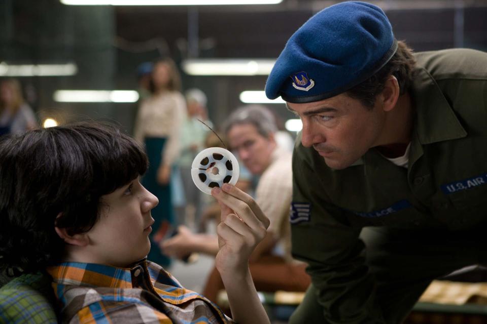 Left to right: Zach Mills plays Preston and Kyle Chandler plays Jackson Lamb in SUPER 8, from Paramount Pictures.