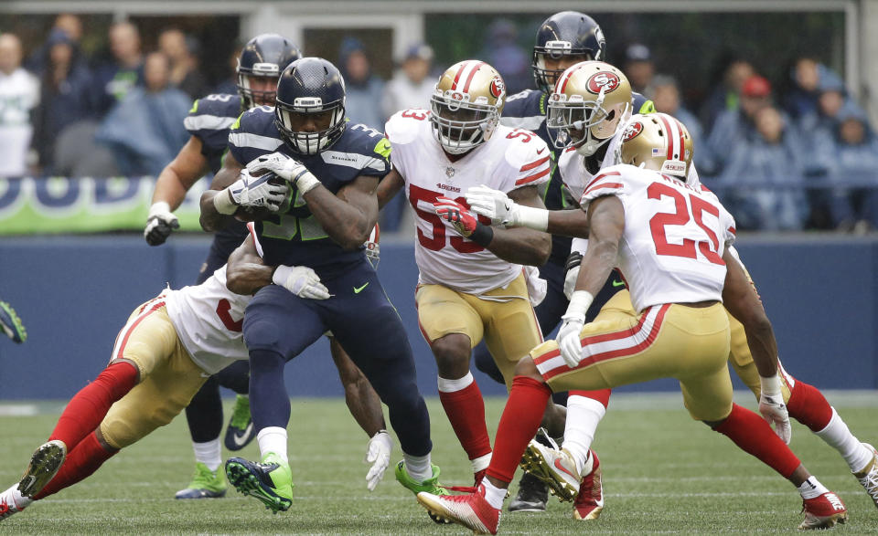 Chris Carson, piling up yards at home against the Niners. He appears to have ascended to the top of the backfield depth chart in Seattle. (AP Photo/Elaine Thompson)